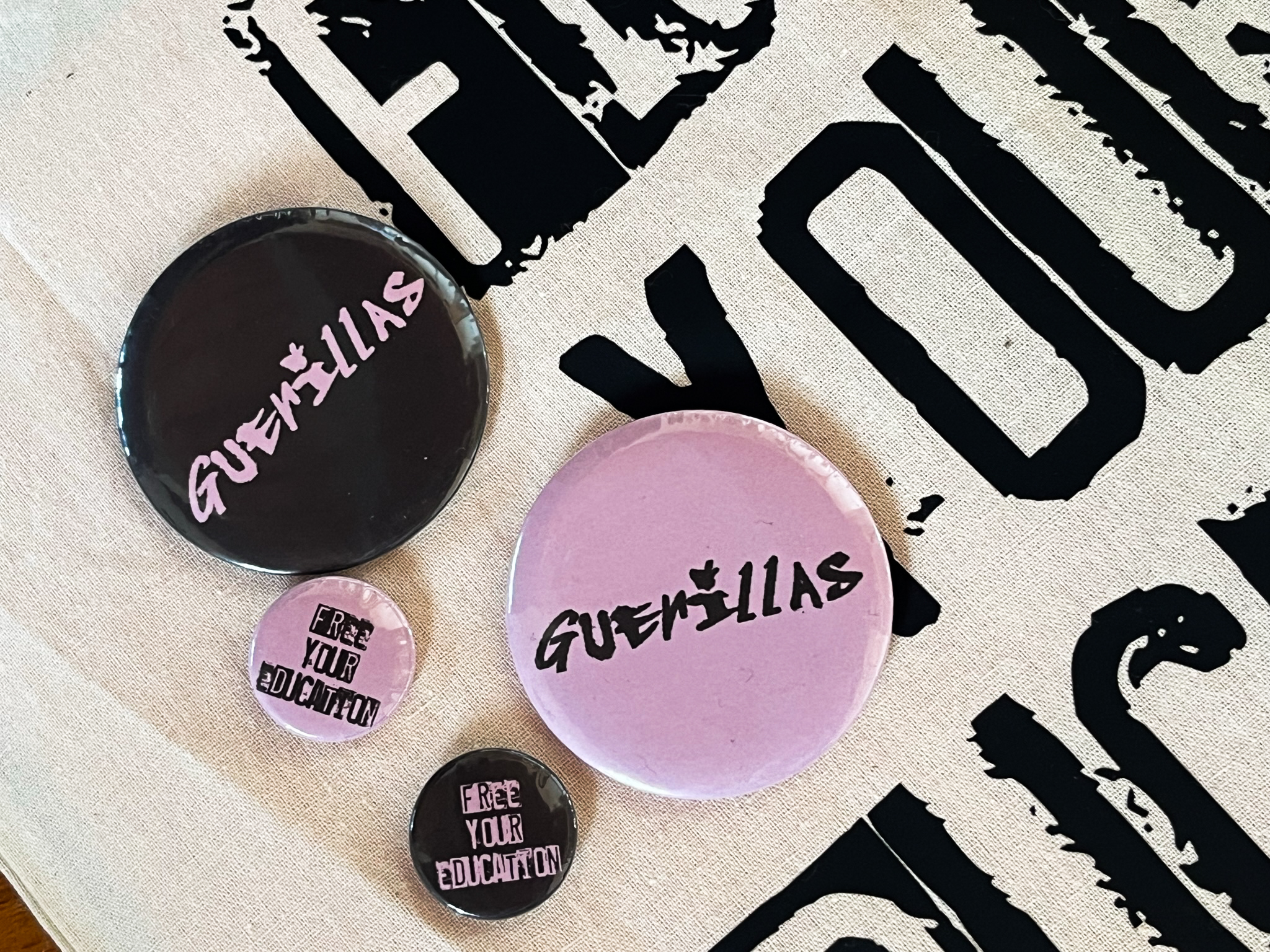 Guerillas — badges and tote